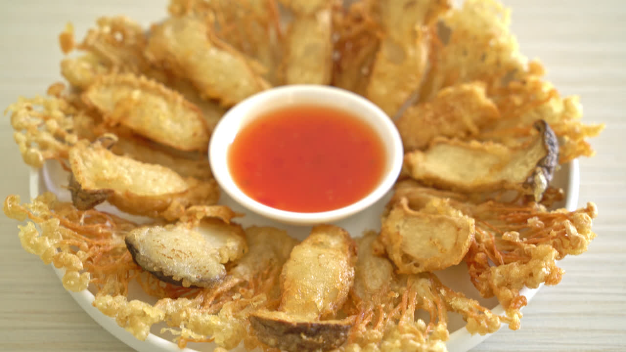 deep fried Enoki mushroom and King Oyster mushroom with spicy dipping sauce - vegan food style
