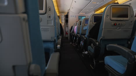 rows of seats in the cabin during the flight