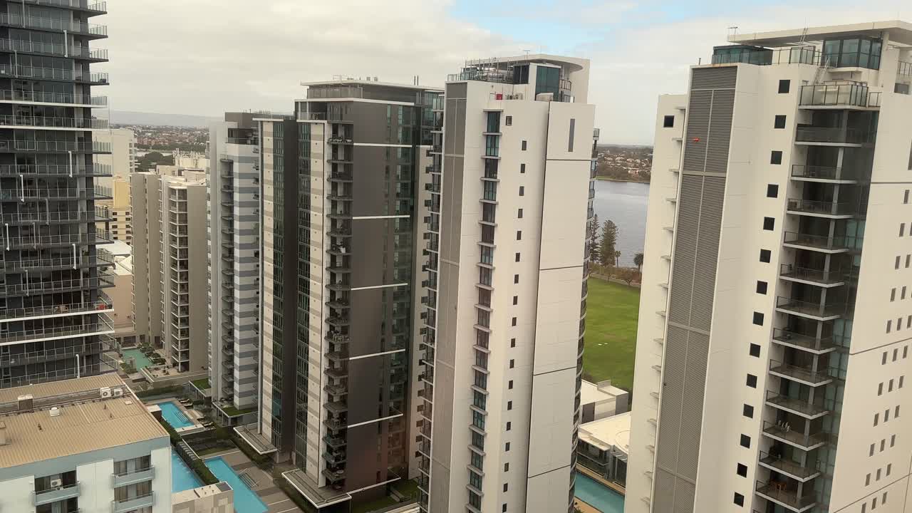 Hotel high rise apartments, East Perth on Langley Park. Pools with Swan River in background.