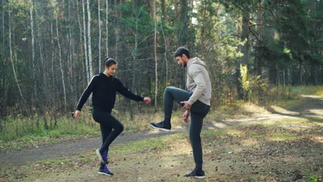 couple exercising outdoors in the forest