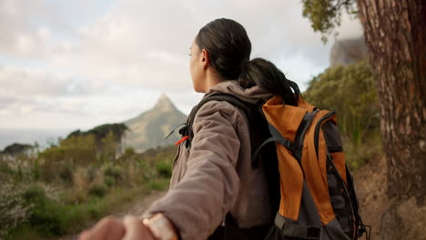 hiking, smile and holding hands with a woman