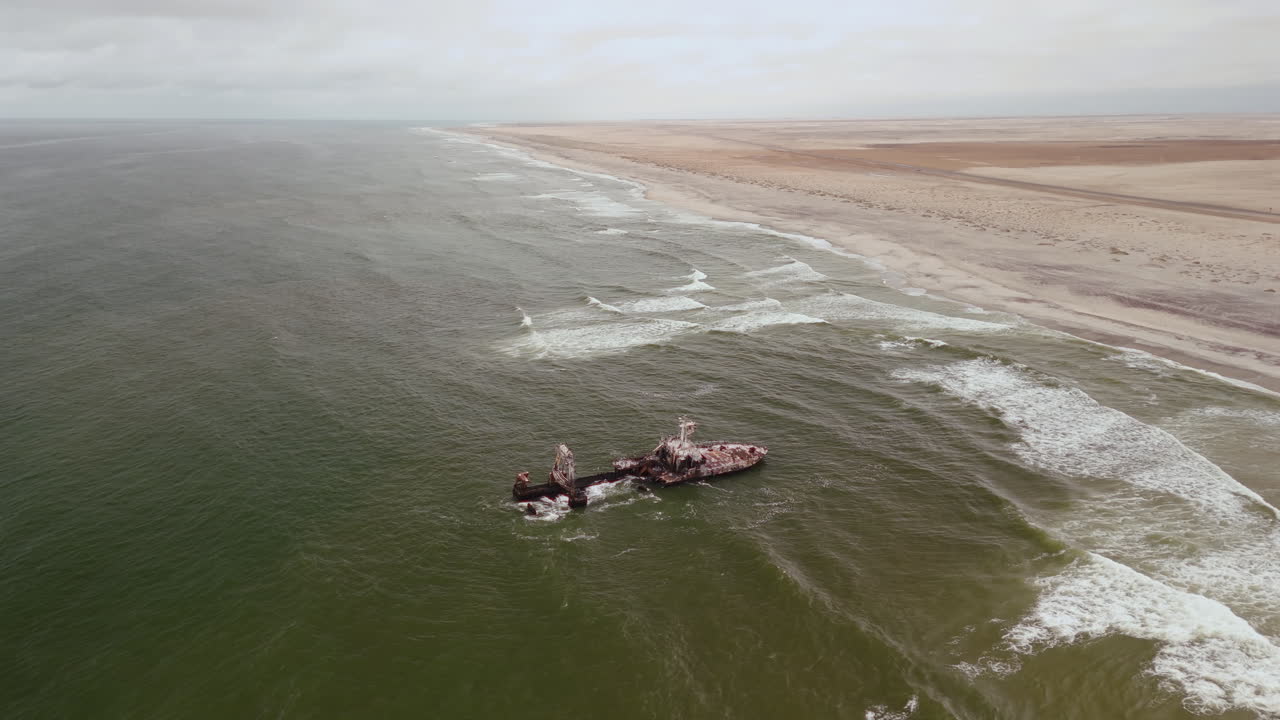 Aerial View of a Shipwreck on a Desolate Coast