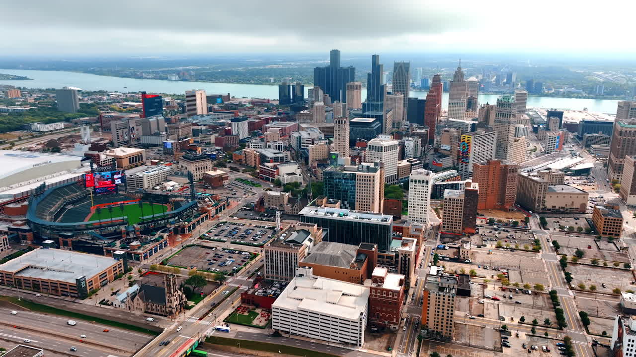 Detroit, USA, 28 July 2025: Detroit skyline over Comerica Park. Aerial view of downtown Detroit with Comerica Park and the river at the horizon