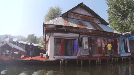 floating market on a house boat at dal lake , srinagar , kashmir valley, india