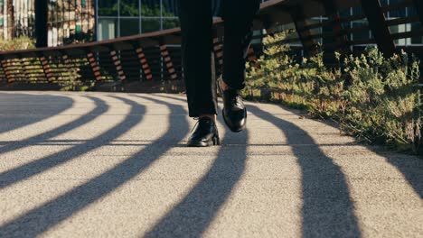 Man businessman boss walking near his office center in a dark business suit, Experienced CEO entrepreneur in modern office district