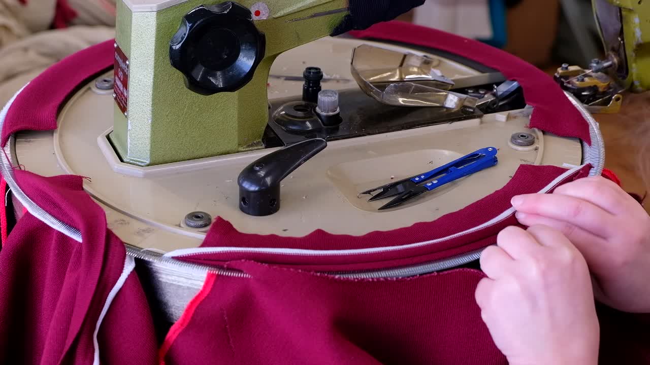 Sewing machine working on textile