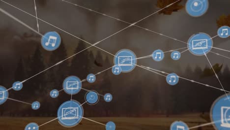 Animation-of-network-of-connections-with-icons-over-fall-landscape