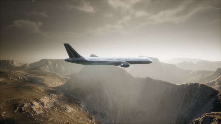 Passenger aircraft over mountain landscape