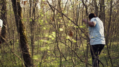 civilian search party beginning the manhunt within the forest area