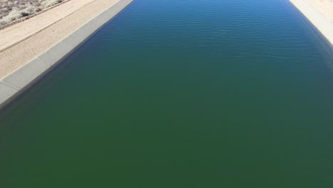 Aerial-pan-up-over-the-California-aqueduct-delivering-water-to-a-drought-stricken-state