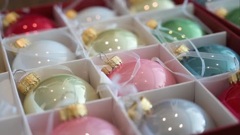 shiny colorful christmas tree balls stored in a box after the holiday