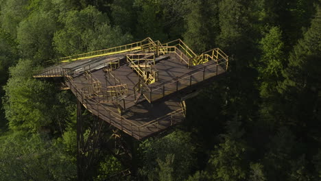 starting platform and landing slope of a old ski jumping hill in the forest of bakuriani in georgia