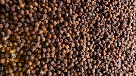 close-up of black peppercorns