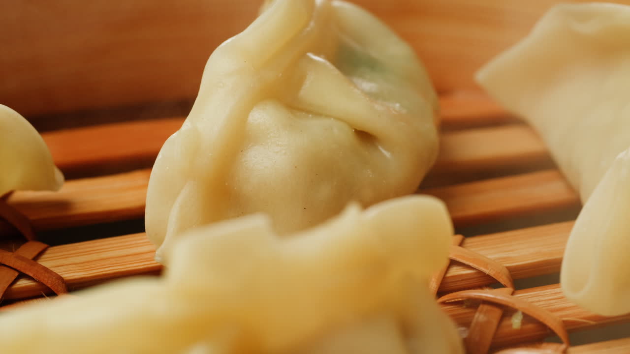 Delicious Steaming Dumplings in Traditional Bamboo Steamer