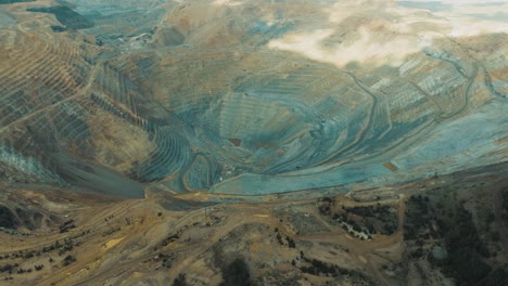 bingham copper mine in utah - aerial pull back to reveal the salt lake valley