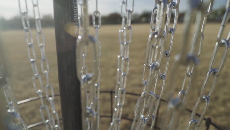 The-Chains-of-a-Disc-Golf-Basket-Close-Up-and-in-Slow-Motion