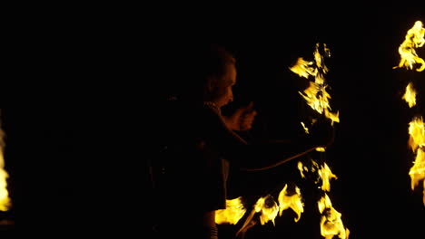 fire dancer performance at night
