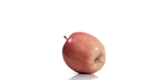 manzana girando en cámara súper lenta