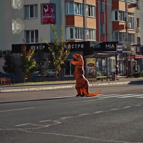 funny man in t rex costume