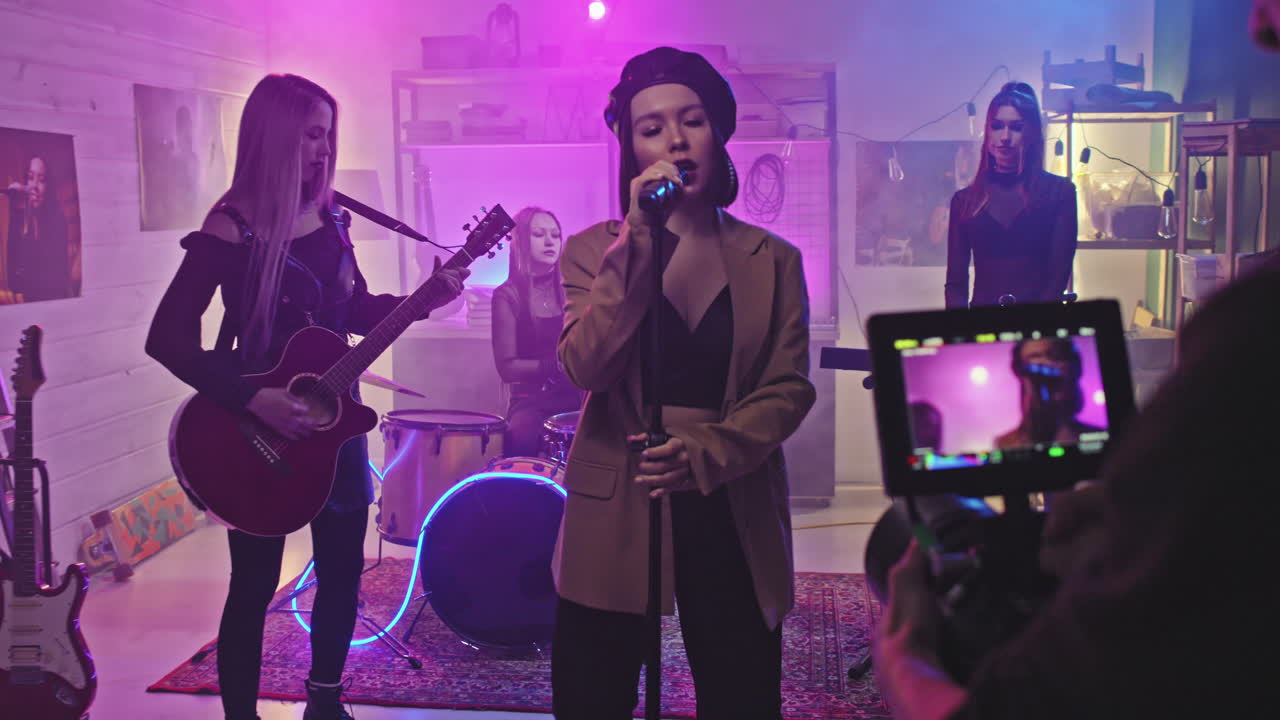 Female Rock Group Filming Music Video