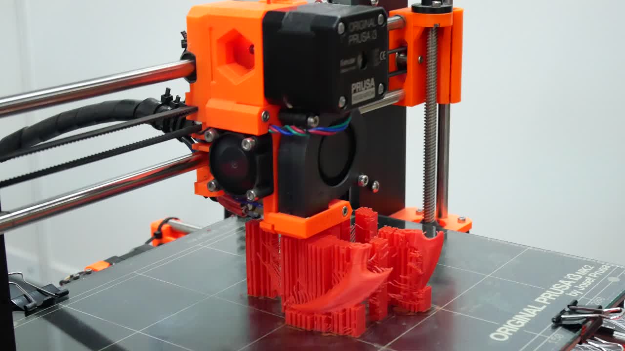 3D printers are printing digital images from computers in 3D form. Image is printed using a special machine and material.