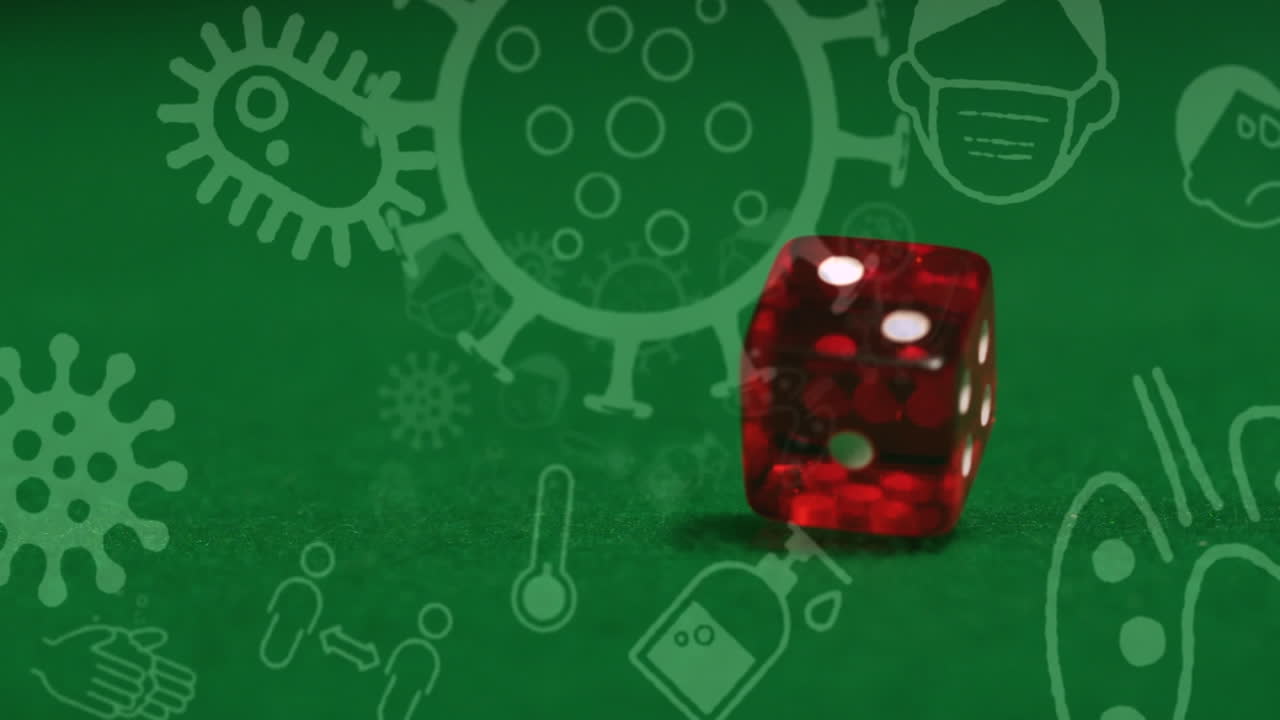 animación de células e iconos de covid-19 sobre dos dados en un fondo verde