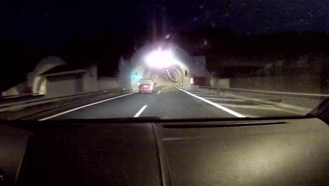 Entering-a-tunnel-in-the-Pindos-Mountains,-driving-on-the-autobahn-between-Thessaloniki-and-Ioannina-in-the-northwest-region-of-Greece