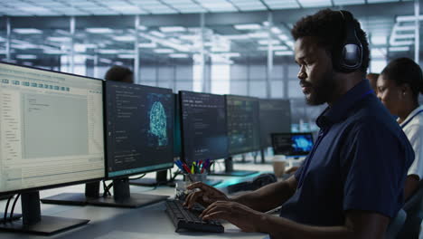 it staff working in a server room