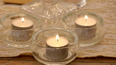 Shot-of-Flower-and-candle-used-for-a-funeral