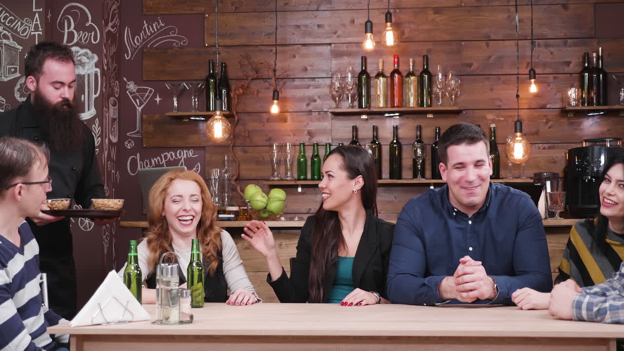 People gathering at the bar
