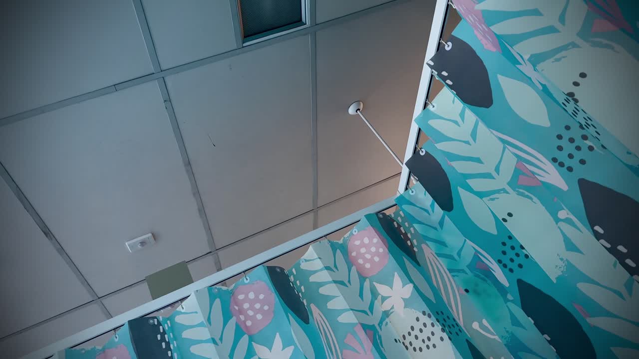 Oblique hospital ceiling with surrounding curtains ward medical Perth WA