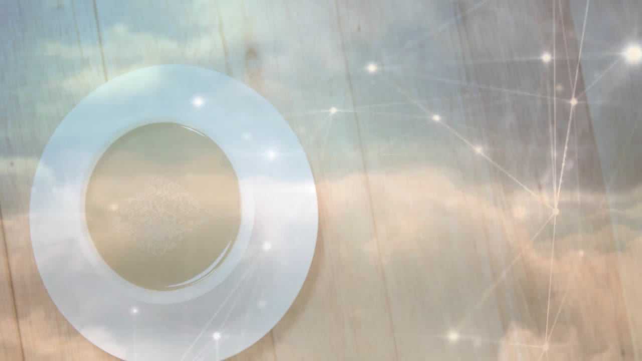 White ceramic saucer being visualized on light wooden tabletop, with glowing network nodes overlay
