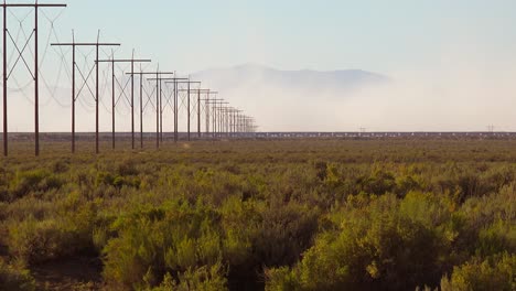 A-train-travels-in-the-distance-across-a-desert-1