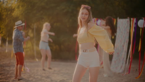 beautiful young woman grooving against friends