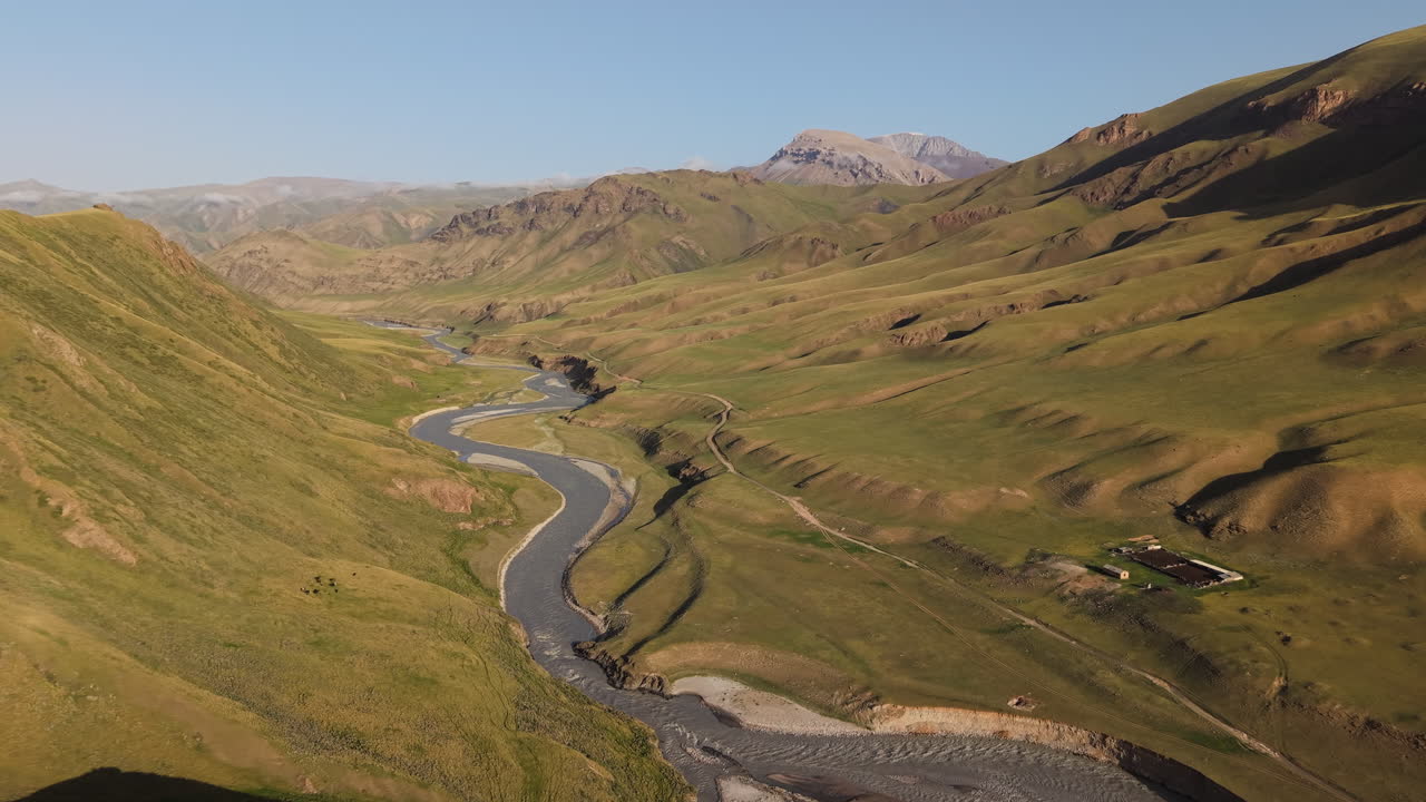 Kurumduk River Along The Mountains in Kyrgyzstan. - aerial shot