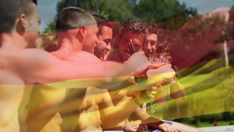 Animation-of-flag-of-germany-over-happy-caucasian-male-friends-having-fun-at-swimming-pool