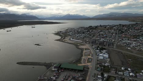 patagonian landscape city of puerto natales chile, aerial drone above coast water city architecture and scenic skyline