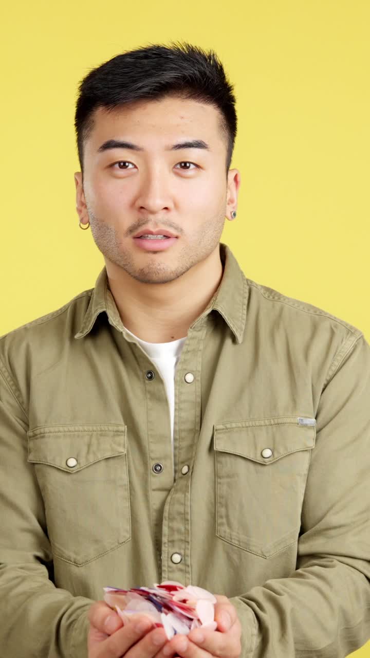 Man celebrating with confetti