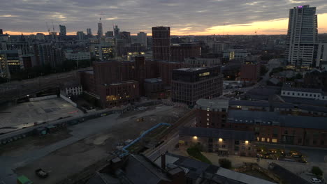 establishing drone shot over leeds city centre before sunrise