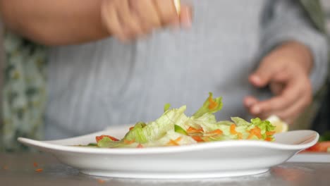 chef preparing a fresh salad