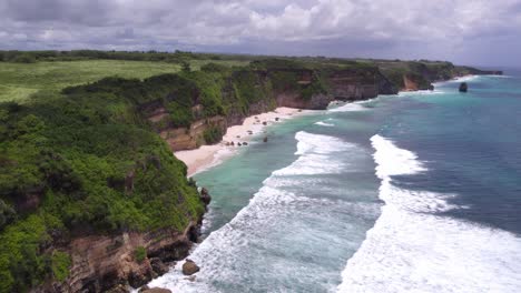 Mbawana-beach-at-Sumba-island-during-a-cloudy-day,-aerial