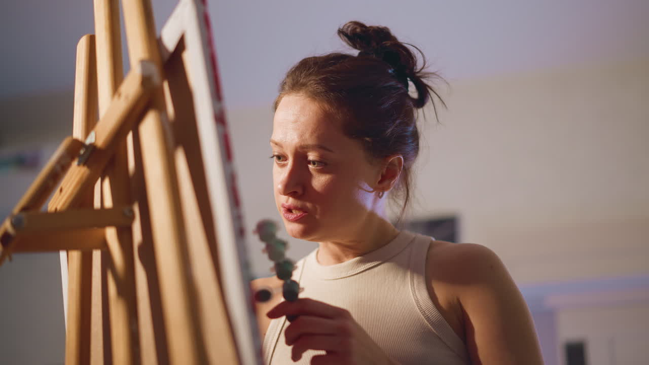 Closeup Of Artistic Reaction, Artist Displays Happiness And Astonishment During Creative Session, Passionate Creator Reacts With Delight To Fresh Blend Of Vibrant Paints In Cozy Studio Setting