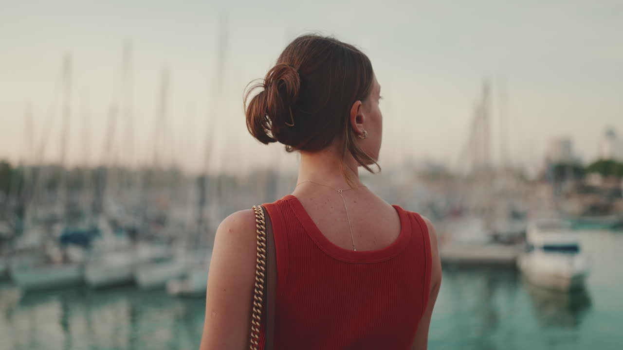 Woman Overlooking Marina