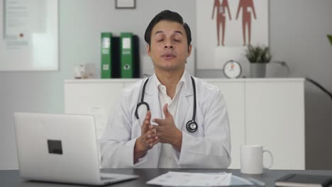 indian doctor explaining the procedure to patient