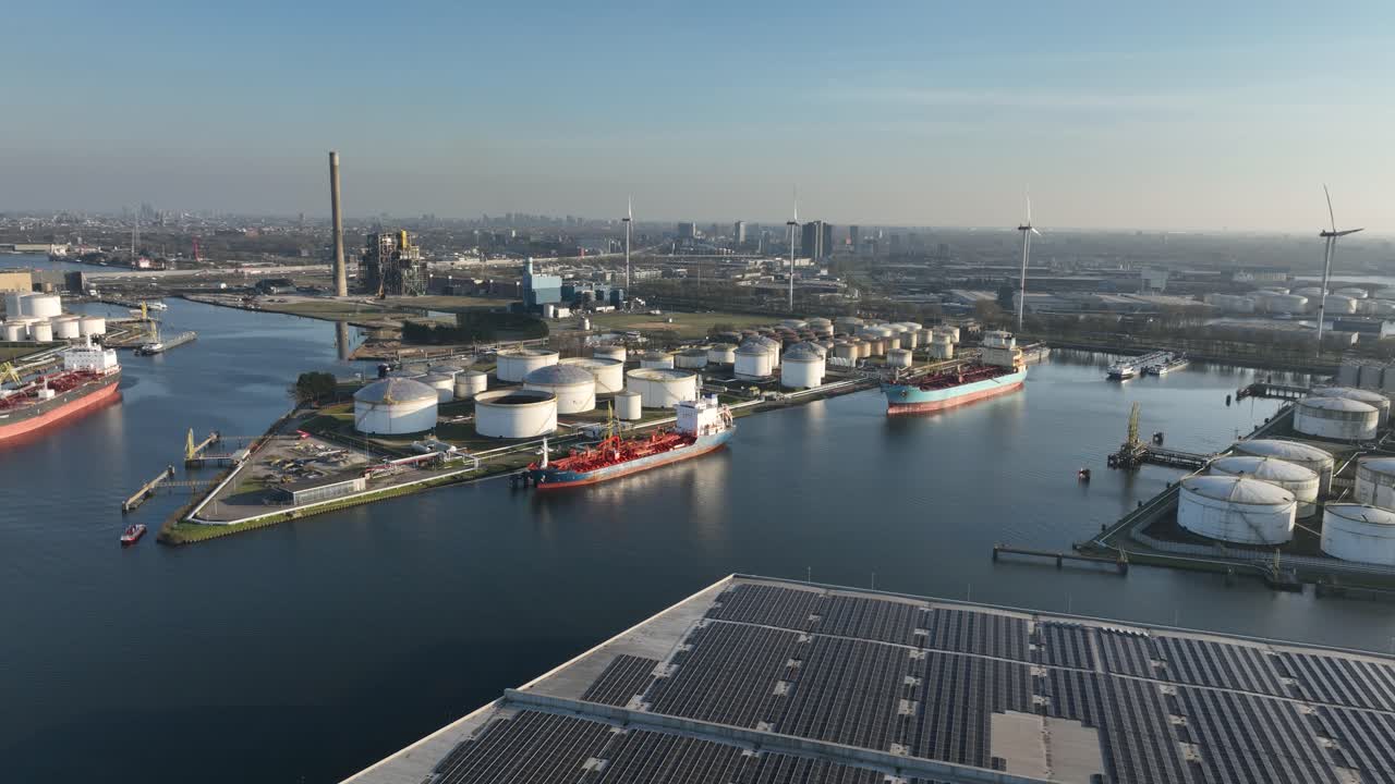 Port of Amsterdam, petroleum storage silos and tanker vessels, aerial view, The Netherlands