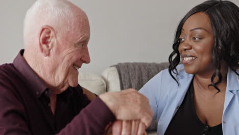 elderly man with caregiver at home