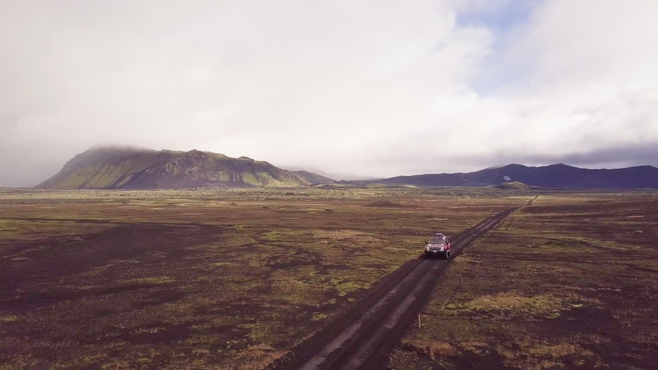 Icelandic Volcanic Landscape with Off-Road Vehicle