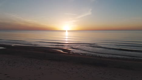 Aerial-View-of-the-Baltic-Sea-at-Sunset,-Jurkalne,-Latvia