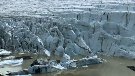 zoom-in of vatnajokull glacier and glacier lagoon in iceland