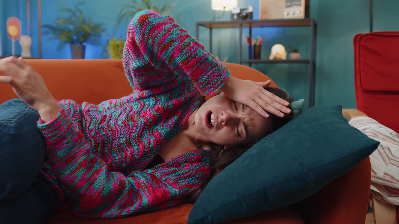 Displeased caucasian woman rubbing temples to cure headache problem suffering from migraine stress